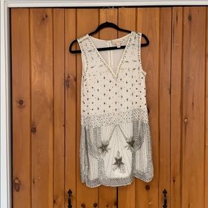 Anthropologie embellished and scalloped mini